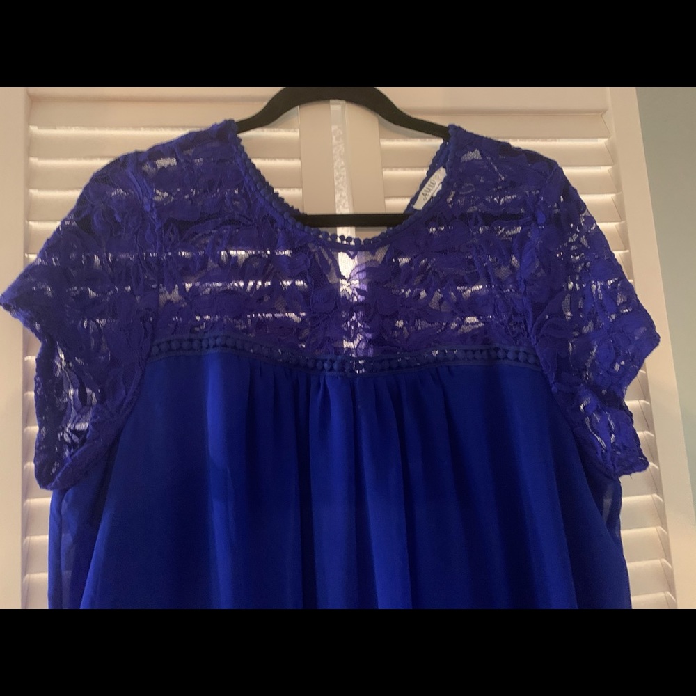 Never worn! Blue lined baby doll dress with lace!